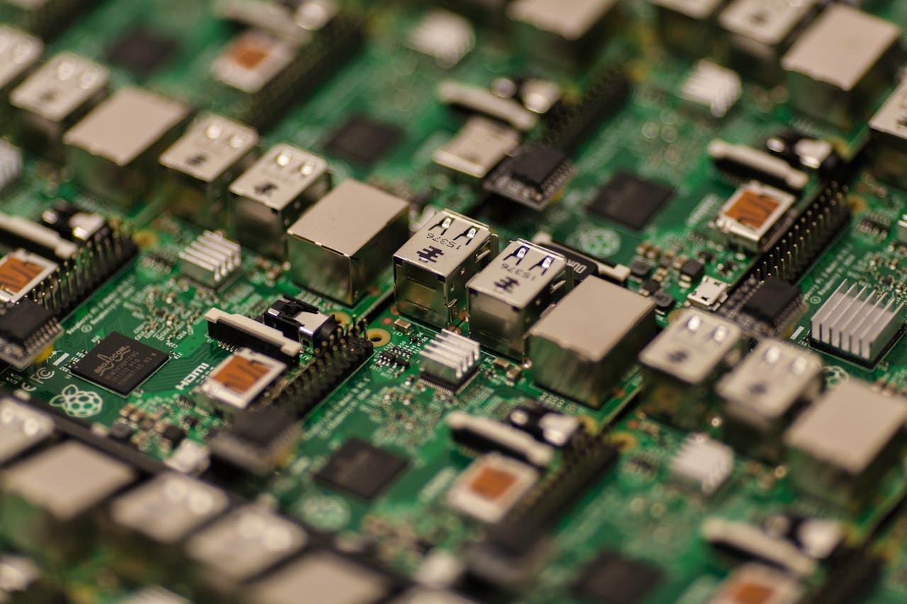 Close-up of a development board with USB ports and electronic components.